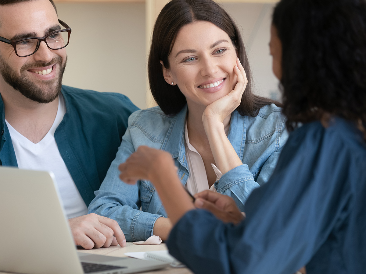 couple talking with agent