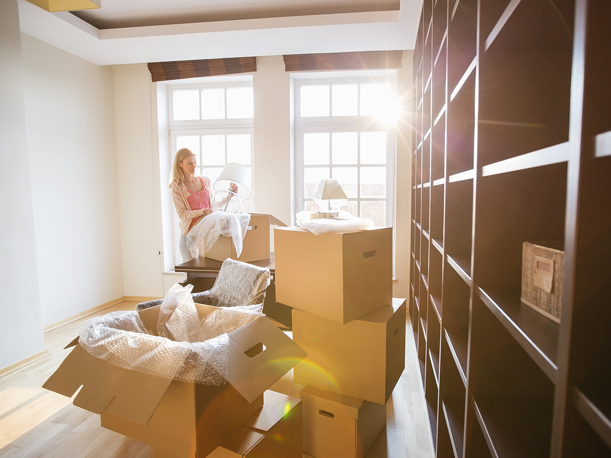 preson with moving boxes