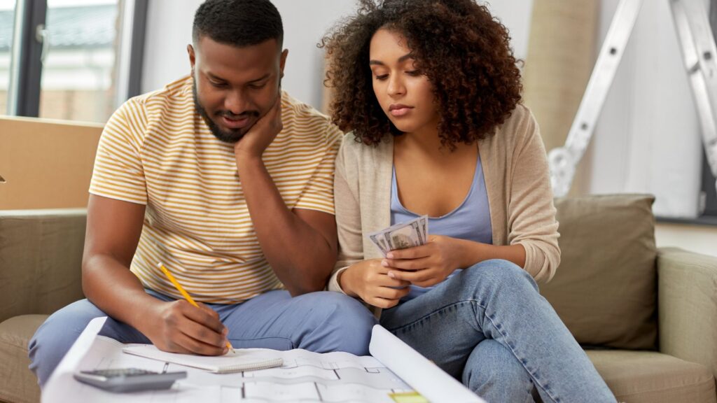 couple makes a budget for a new home
