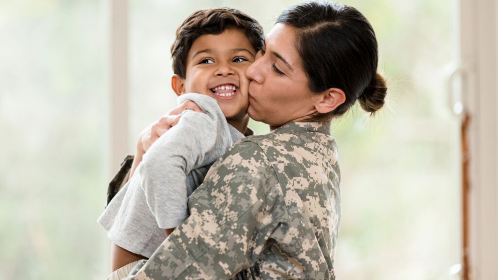 mom kissing son