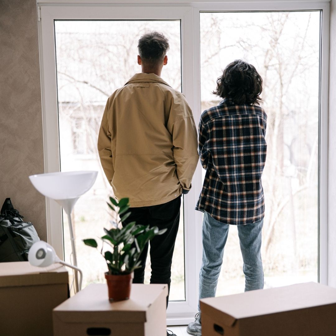 couple looking out back window